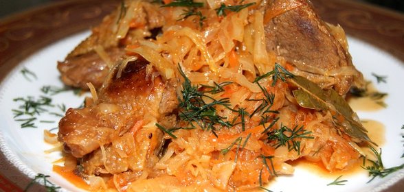 Утка, тушеная с капустой