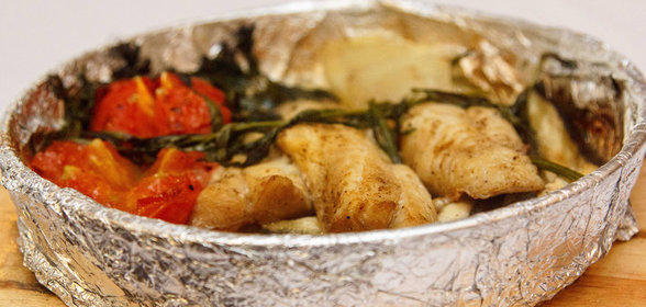 Рыба, запеченная с овощами