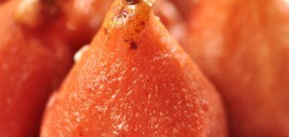 Груши с клюквой в медовом сиропе со специями