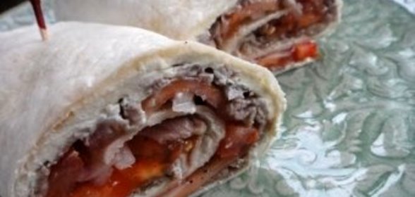 Говядина, запеченная в духовке с сыром и помидорами