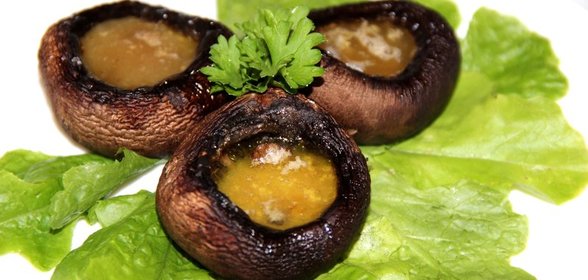 Запеченные шампиньоны с маслом
