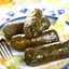 Козий сыр в виноградных листьях, маринованный в вине