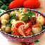 Молодой картофель с луком и помидорами