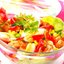Салат из курицы с помидорами, сладкой кукурузой и сухариками