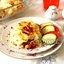 Мешочки из лаваша с мясом и овощами под соусом бешамель