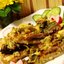 Мясо на дранике с овощами