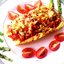 Вегетарианский кабачок, фаршированный сезонными овощами и пармезаном