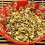 Рыбный салат из консервов с рисом и яйцом