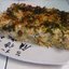 Кугель из цветной капусты и порея с миндально-травяной корочкой