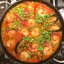Паэлья с уткой и морским гадами
