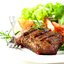 Маринованные в красном вине и розмарине говяжьи стейки