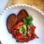Печеные баклажаны и перцы с чесноком и зеленью