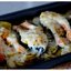 Форель под сливочно-чесночным соусом, запеченная на картофельной подушке