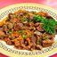 Мясо, жаренное с грибами и морковью