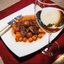 Куриная печенка с виноградом и жареным луком