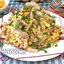 Салат с копчёной колбасой, сухариками и кукурузой
