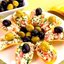 Сырная закуска с помидорами и чесноком на чипсах