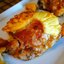 Ароматная курица, запеченая с ананасом и картофелем