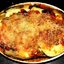 Баклажаны запеченные в томатном соусе под сыром