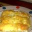 Белая рыба под овощами и сметаной