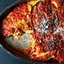 Баклажаны, запеченные с сыром и помидорами