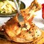 Свиной окорок с тушеной капустой и печеным пастернаком
