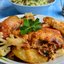Куриные окорочка с овощами и грибами под сырно-сливочным соусом в духовке
