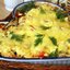 Свинина с грибами и сметаной под сырной корочкой