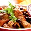Курица с каперсами, анчоусами, чесноком и оливками в томатном соусе