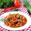 Гуляш из свинины с красным вином и зелёным горошком