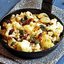 Цветная капуста с изюмом и каперсами