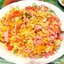 Итальянский салат с овощами, ветчиной и сыром