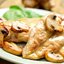 Курица под сырно-грибным соусом