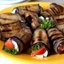 Рулетики из баклажана с фетой и помидорами