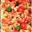 Картофельный гратен, запеченный с сыром и индейкой в сливочном соусе, с томатами