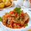 Говядина тушёная в казане с овощами