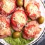 Индейка, запеченная под сыром с помидорами