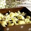 Запеченная цветная капуста с заправкой из маслин