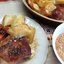 Куриные бедра с картофелем и помидором