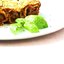 Каннеллони с куриной печенью и ветчиной под соусом из потрошков