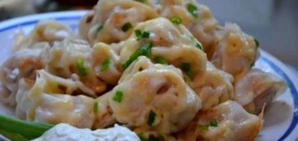 Пельмени жареные под сыром