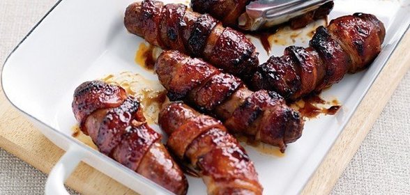 Говяжьи сосиски в беконе