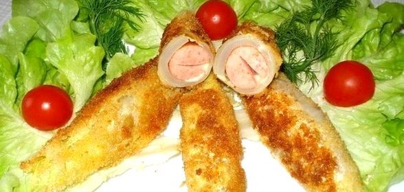 Сосиски с сыром в капусте